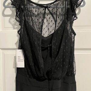 Black knit jumpsuit with lace top
